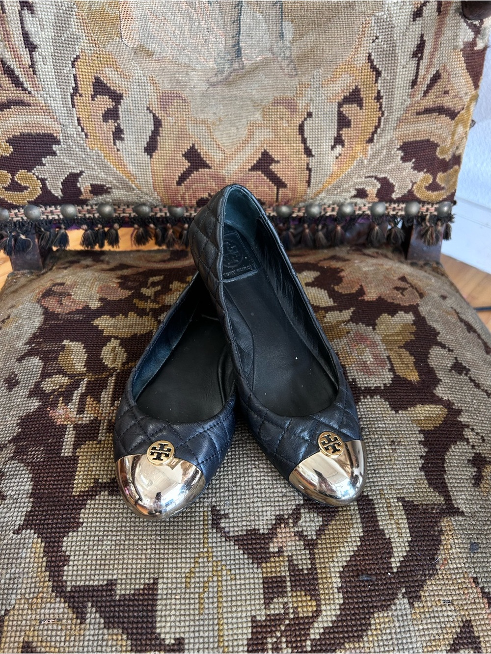 Tory Burch Black Quilted Leather Ballet Flats with Gold Cap Toe